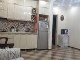 Продается 2-комнатная квартира 53 кв. м в элитном доме на проспекте Руставели в Батуми. - фото 11