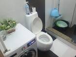 Продается 2-комнатная квартира 53 кв. м в элитном доме на проспекте Руставели в Батуми. - фото 13