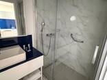 Продаётся студия 29 кв. м на 43 этаже за 45000$ в Батуми в жк Orbi City, корпус C. - photo 3