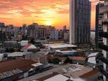 Студия с панорамным видом на закаты Батуми в премиальном комплексе Sunrise Residence - фото 1