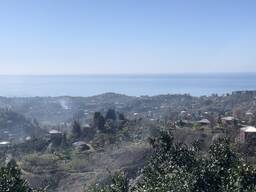 Участок и два дома с видом на море Ачква